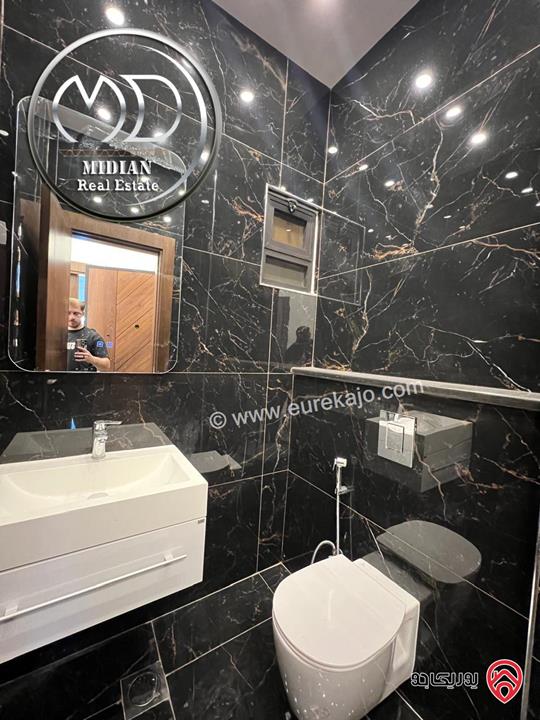 شقة ارضية جديدة للبيع في عمان - ضاحية النخيل مساحة 185م مع ترس 50م تشطيبات ديكورات فاخرة بسعر مميز