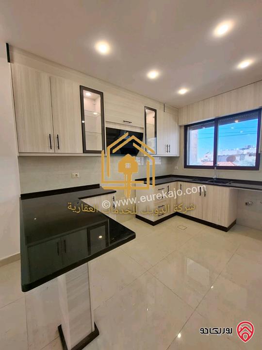 شقة جديدة لم تسكن طابق ثاني مساحة 150م للإيجار في عمان - الجندويل 