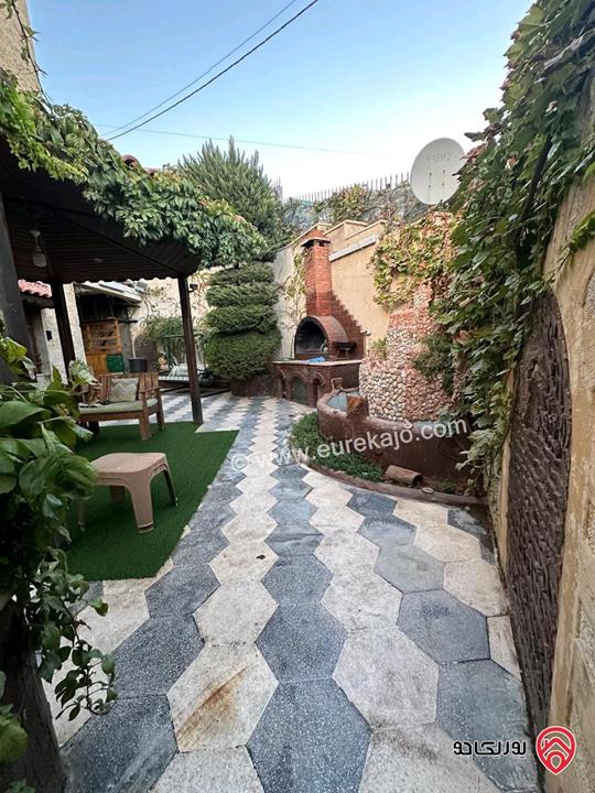 شقة أرضية مساحة 200م داخلي و 200 م خارجي للبيع في عمان - طبربور