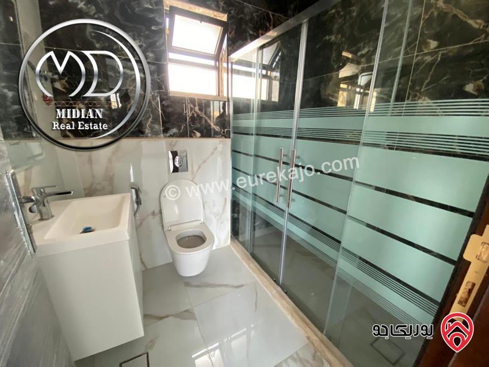 شقة شبه ارضي جديدة للبيع في عمان - الصويفية مساحة 165م مع ترس و حديقة 150م تشطيبات سوبر ديلوكس بسعر مميز جداً