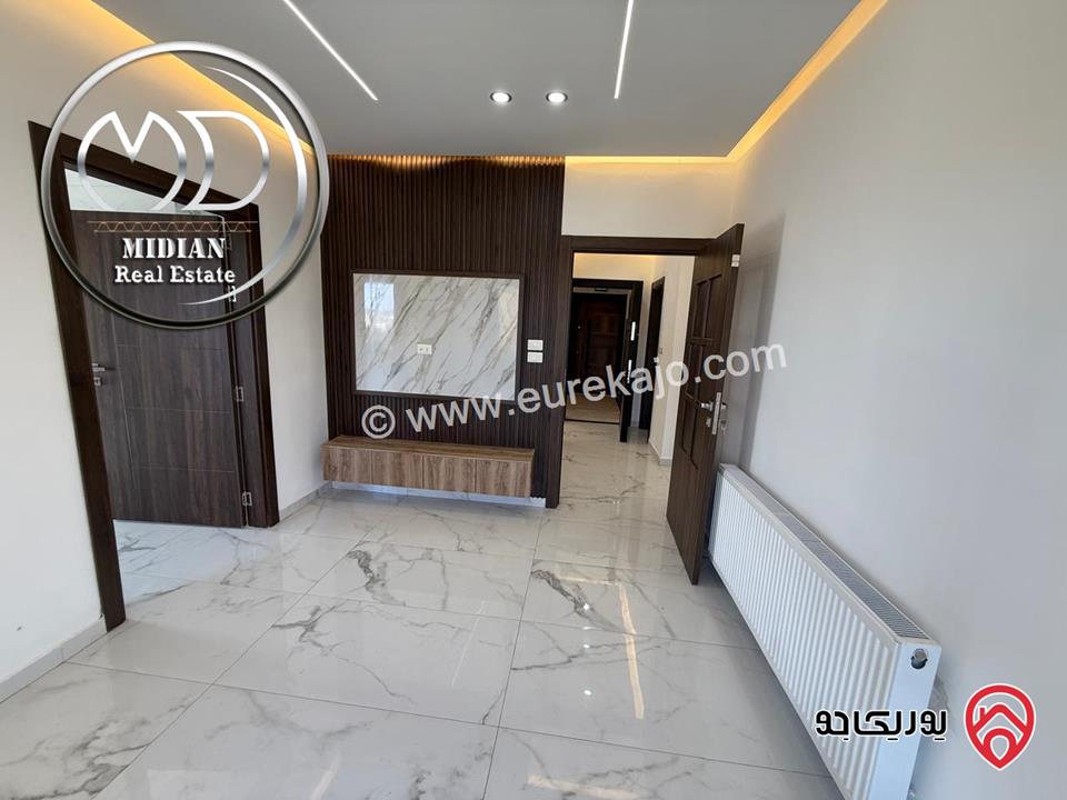 شقق أرضي و شبه أرضي جديدة للبيع في عمان - المدينة الرياضية مساحات 130م & 170م تشطيبات ديكورات سوبر ديلوكس بأسعار مميزة