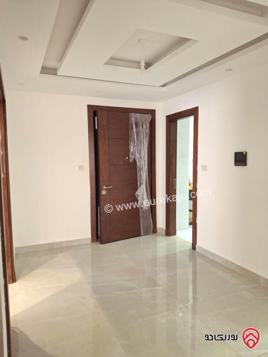 شقة جديدة طابق أول مساحة 180م للبيع في عمان - دير غبار