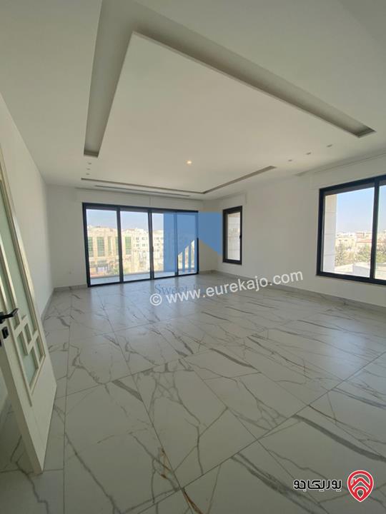 شقة فاخرة للبيع في عمان - أم السماق الشمالي خلف جامع التلاوي طابق ثالث 210م مع روف دوبلكس 120م لم تسكن