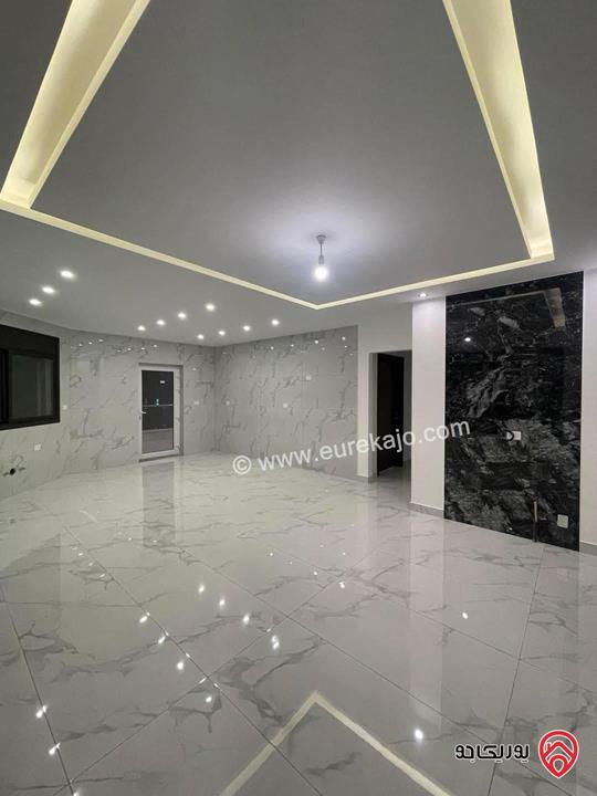 شقة فاخرة جديدة ارضية مساحة 188م داخلي و 90م خارجي للبيع في عمان - الجبيهة