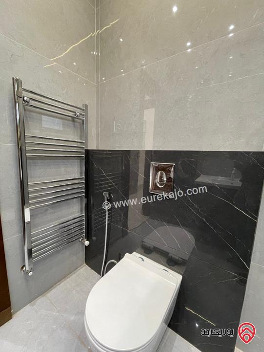 شقة تشطيب سوبر ديلوكس طابق أرضي مساحة 205م داخلي و 65م خارجي مع كراج ومدخل خاص للبيع في عمان - البنيات