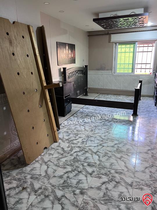 شقة شبه أرضية مساحة 100م داخلي و 100م خارجي للبيع في عمان - الجبيهة 