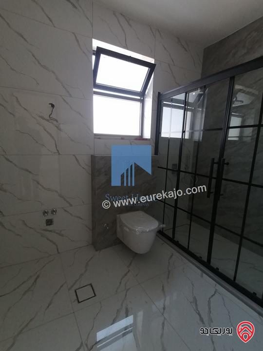 شقة فاخرة للبيع في عمان أم السماق - خلف السيتي مول وقرب مكة مول طابق ارضي 250م تشطيب سوبر ديلوكس لم تسكن