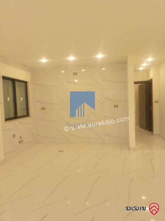 شقة فاخرة طابق ثاني 70م تشطيب سوبر ديلوكس لم تسكن للبيع في عمان - الجندويل  