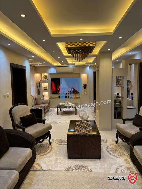 شقة فاخرة للبيع في عمان - خلدا خلف السيتي مول 180م مع حديقة وترسات 120م بسعر مغري