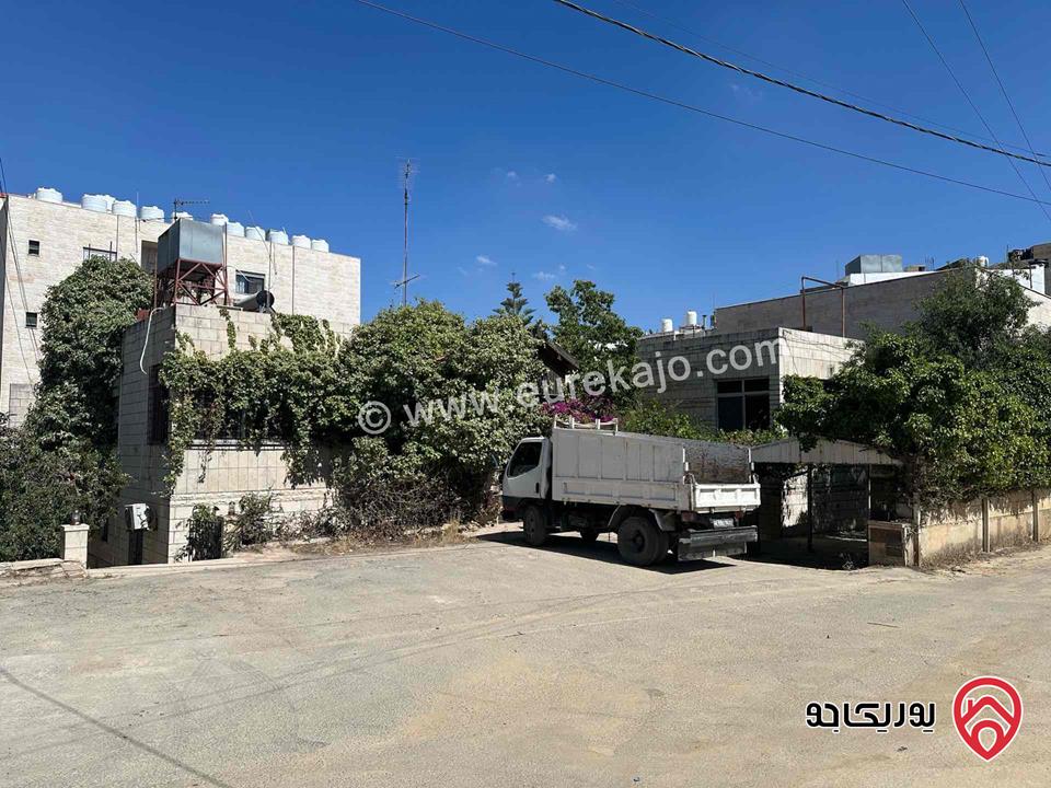 قطعة ارض مساحة 612م عليها بيت قديم للبيع في عمان - الجندويل