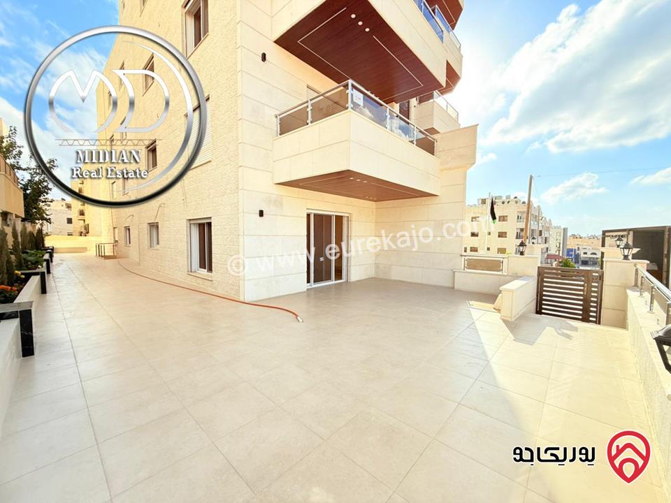 شقة ارضية للبيع في عمان - خلدا مساحة 180م مع ترس وحديقة 200م تشطيبات ديكورات عصرية فاخرة جديدة لم تسكن