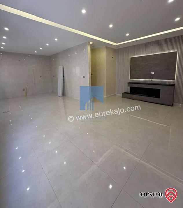 شقة أرضية فاخرة للبيع في عمان - تلاع العلي - خلف طواحين الهوا 180م مع ترس 40م لم تسكن