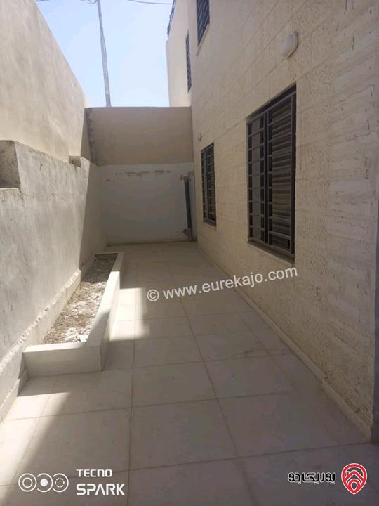 شقة مساحة 100م شبه ارضي للبيع في الزرقاء - مدينة الشرق