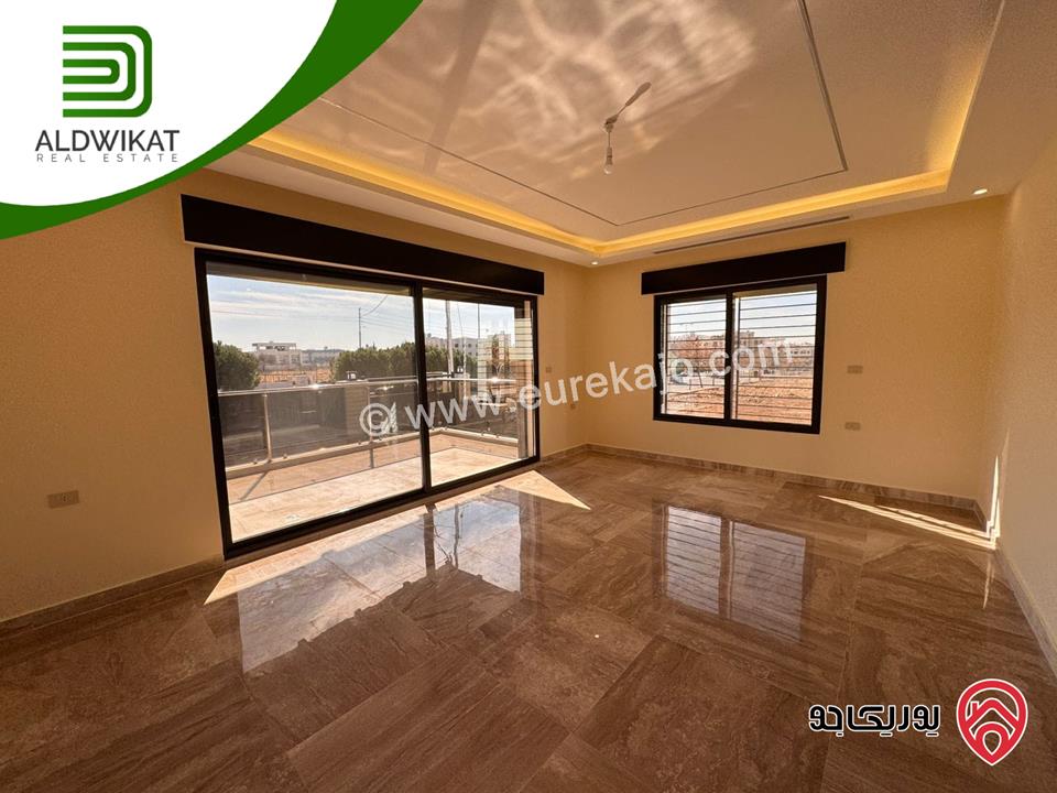 شقة ارضية معلقة للبيع في عمان - خلدا العوجانية المساحة 220م ترس 15م موقع مميز