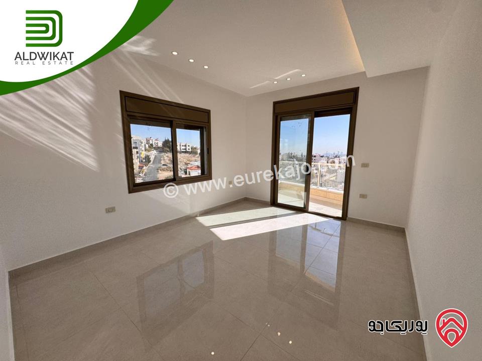 شقة طابقية مع روف للبيع في عمان - تلاع العلي مساحة البناء 260م ومساحة الترس 70م على شارعين