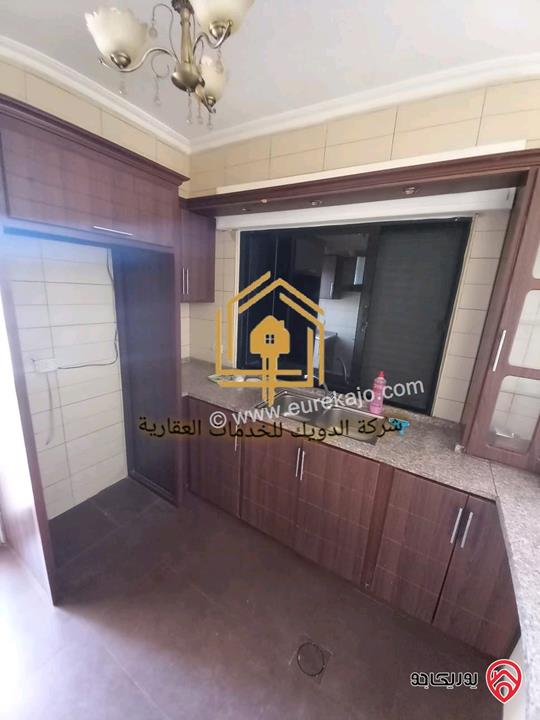 شقة فارغة طابق اول مساحة 110م للإيجار في عمان - الرابية 