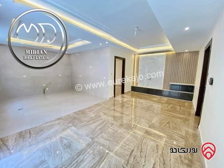 شقة شبه ارضي جديدة للبيع في عمان - ام السماق قرب الستي مول مساحة 160م مع ترس و حديقة 120م تشطيبات ديكورات فاخرة