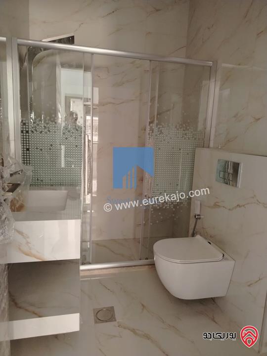 شقة فاخرة للبيع في عمان - خلدا خلف المستشفى السعودي ومقابل ميداس طابق ثالث 180م مع روف دوبلكس 130م لم تسكن