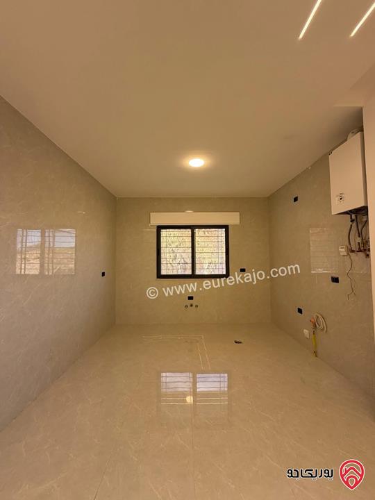 شقة طابق ارضي مساحة 130م مع ترس 50م للبيع في عمان - ربوة عبدون 