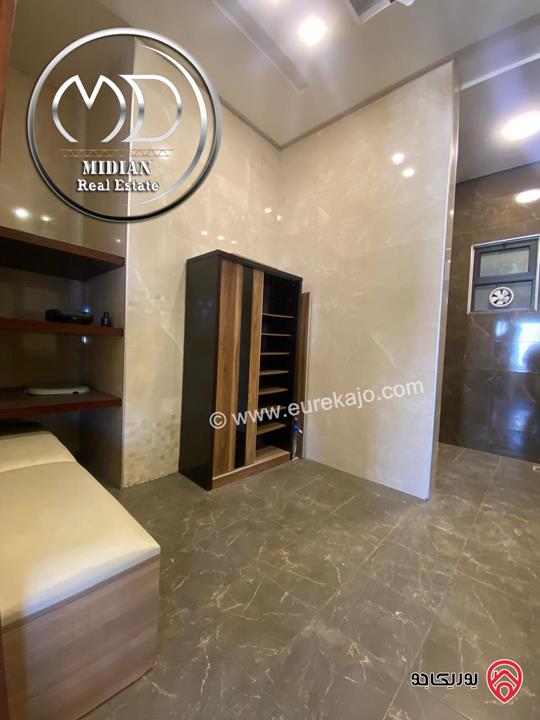 شقة للبيع طابق أخير مع روف في عمان - خلدا - العوجانية مساحة 425م مع تراسات تشطيبات ديكورات فاخرة اطلالة بانورامية خلابة 