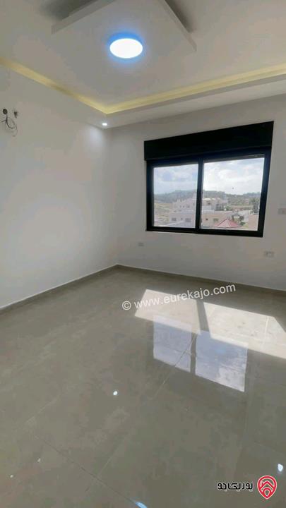 شقة جديدة طابق اول مساحة 140متر للإيجار في عمان - مرج الحمام 