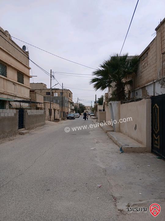 عمارة ثلاث شقق على أرض 443م للبيع في المفرق - حي الحسين