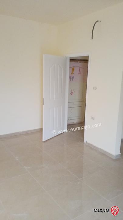 شقة طابق أول مساحة 128م للبيع في عمان - الجبل الأخضر حي نزال الشمالي 