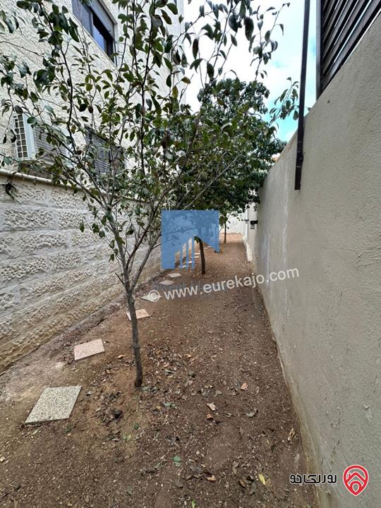 شقة أرضية مميزة للبيع في عمان - الجندويل قرب مركز أمن البيادر 180م مع حديقة وترسات 200م