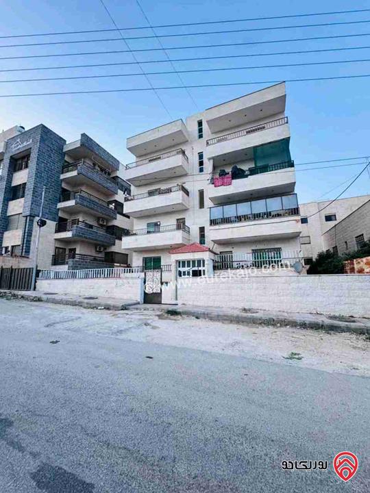 عمارة مكونة من 10 شقق مؤجرة للبيع في مادبا حنينا