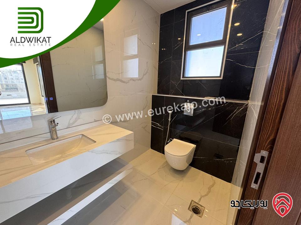 شقة ارضية معلقة للبيع في عمان - خلدا العوجانية المساحة 220م ترس 15م موقع مميز