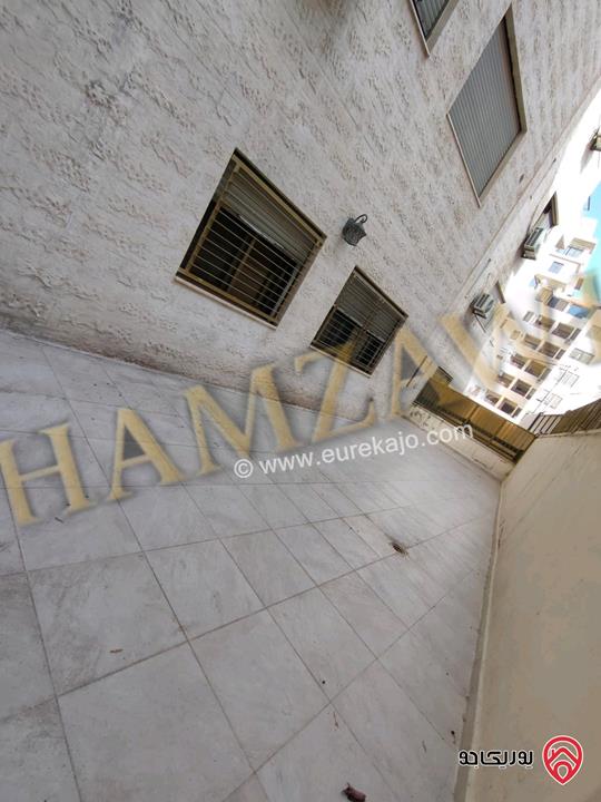 شقة فارغة طابق ارضي مساحة 100م داخلي و 120م خارجي للإيجار في عمان - عبدون 