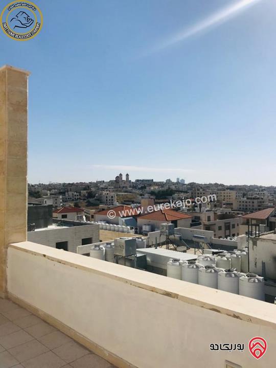 شقة فاخرة للبيع في عمان - خلدا - العوجانية قرب الهمشري طابق ثالث 200م مع روف دوبلكس 140م لم تسكن