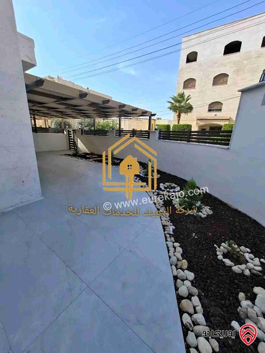 شقة جديدة طابق أرضي مع حديقة مساحه 150م داخلي 130م حديقة للايجار في عمان - الجندويل 