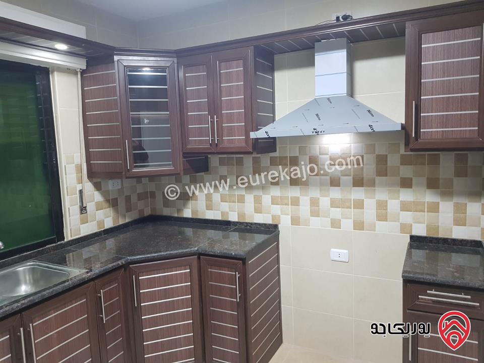 شقة ارضية مساحة 130 م مع ترس امامي 25م وكراج خاص للايجار في عمان - تلاع العلي 