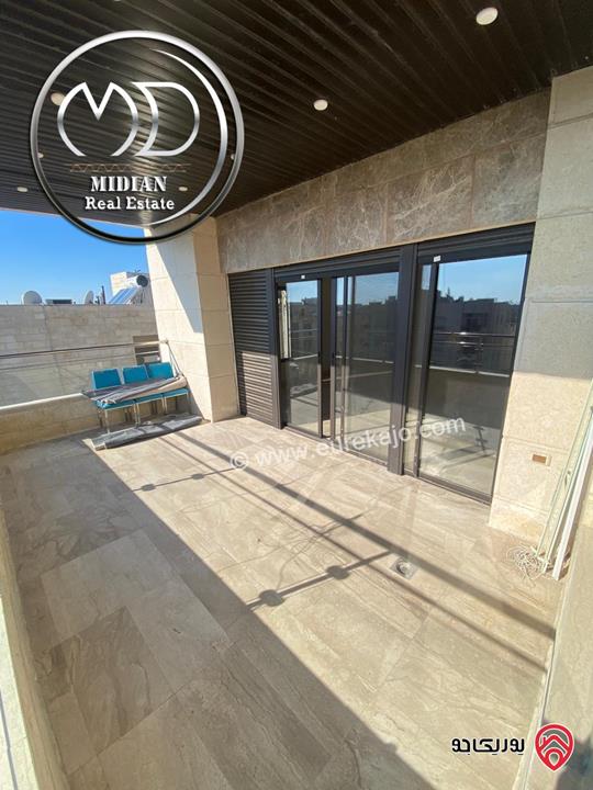 شقة للبيع طابق أخير مع روف في عمان - خلدا - العوجانية مساحة 425م مع تراسات تشطيبات ديكورات فاخرة اطلالة بانورامية خلابة 