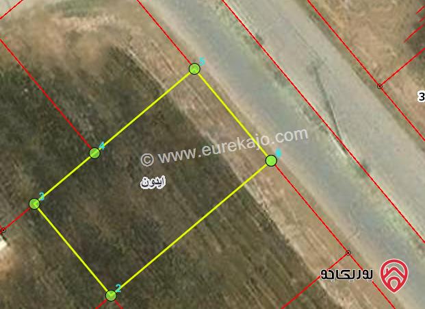 ارض 898م للبيع في اربد - من اراضي ايدون ضمن حوض الماصية الشرقية على شارع المورد الرئيسي 