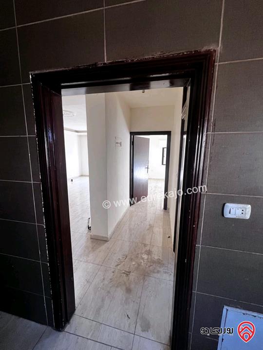 شقة فارغة طابق ثاني مساحة 120م للايجار في عمان - الجندويل 