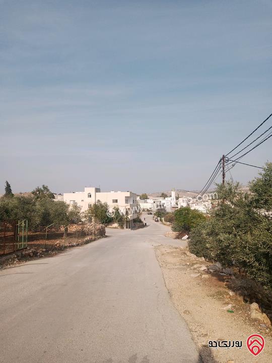 قطعة أرض مساحة 2 دونم و 225م على شارعين رئيسي وفرعي شرقي شمالي صفة التظيم سكن ج وسط للبيع في عجلون - كفرنجه