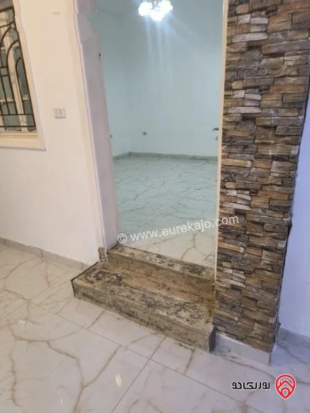 شقة طابق ارضي مساحة 100م + 50م ترس للايجار في عمان - جبل الحسين 