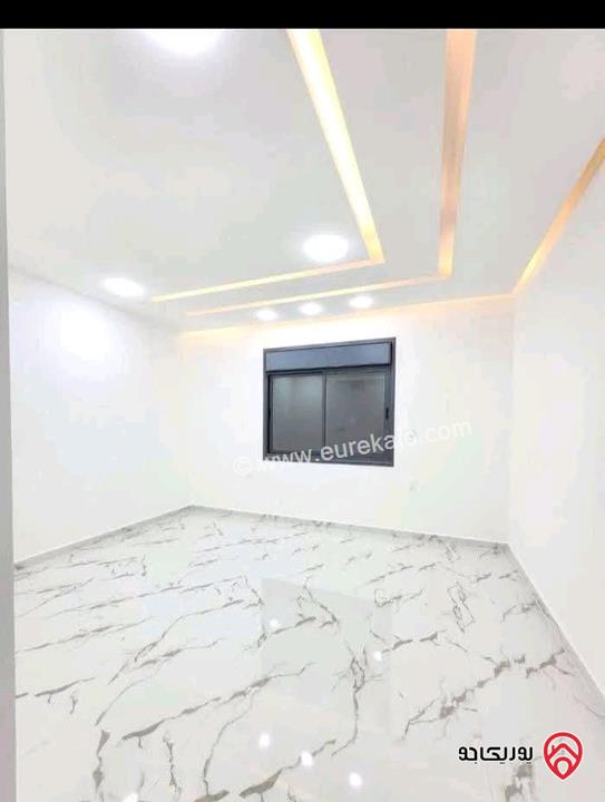 شقة طابق أول هندسي و رووف اطلالة بحرية مساحة 175 م² للبيع في العقبة - السكنية الخامسة تشطيب هايبر ديلوكس 