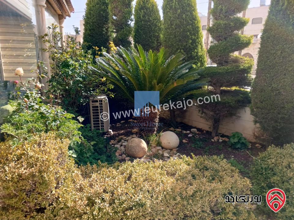 شقة أرضية مميزة مساحة 215م مع حديقة وترسات 120م للبيع في عمان - خلدا