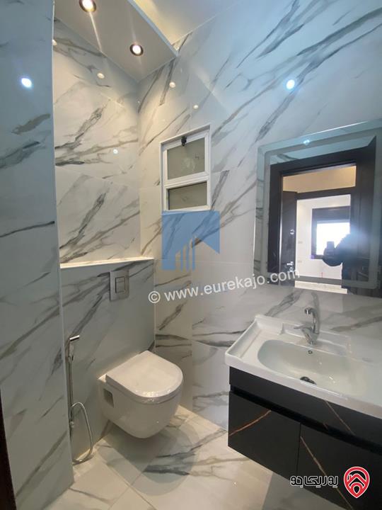 شقة فاخرة شبه أرضية مساحة 160م مع ترس 25م تشطيب سوبر ديلوكس للبيع في عمان - تلاع العلي