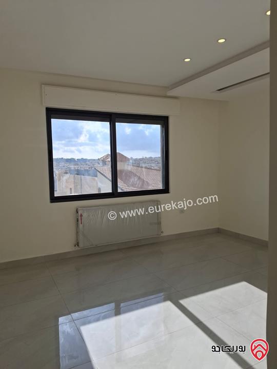 شقة جديدة طابق أول مساحة 175م للبيع في عمان - الرابية