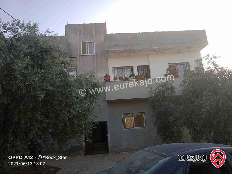 عقار سكني مكون من اربع شقق للبيع في اربد - سحم