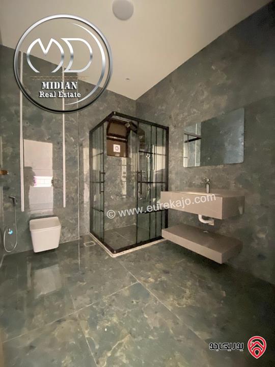 شقق شبه أرضي جديدة للبيع في عمان - ضاحية الرشيد مساحات 210م مع تراسات و حدائق تشطيبات سوبر ديلوكس بأسعار مميزة