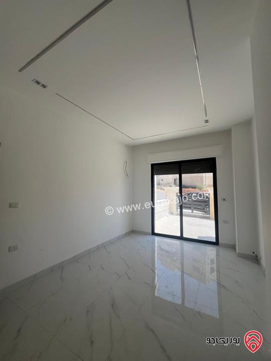 شقة مساحة 100م طابق أول للبيع في عمان - البنيات قرب مدارس الحصاد