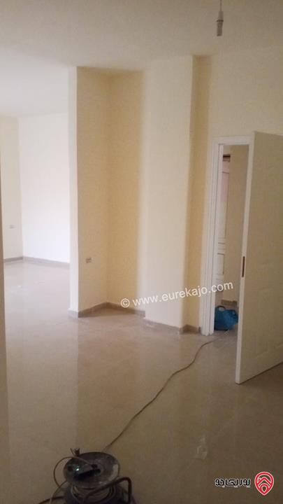 شقة طابق أول مساحة 128م للبيع في عمان - الجبل الأخضر حي نزال الشمالي 