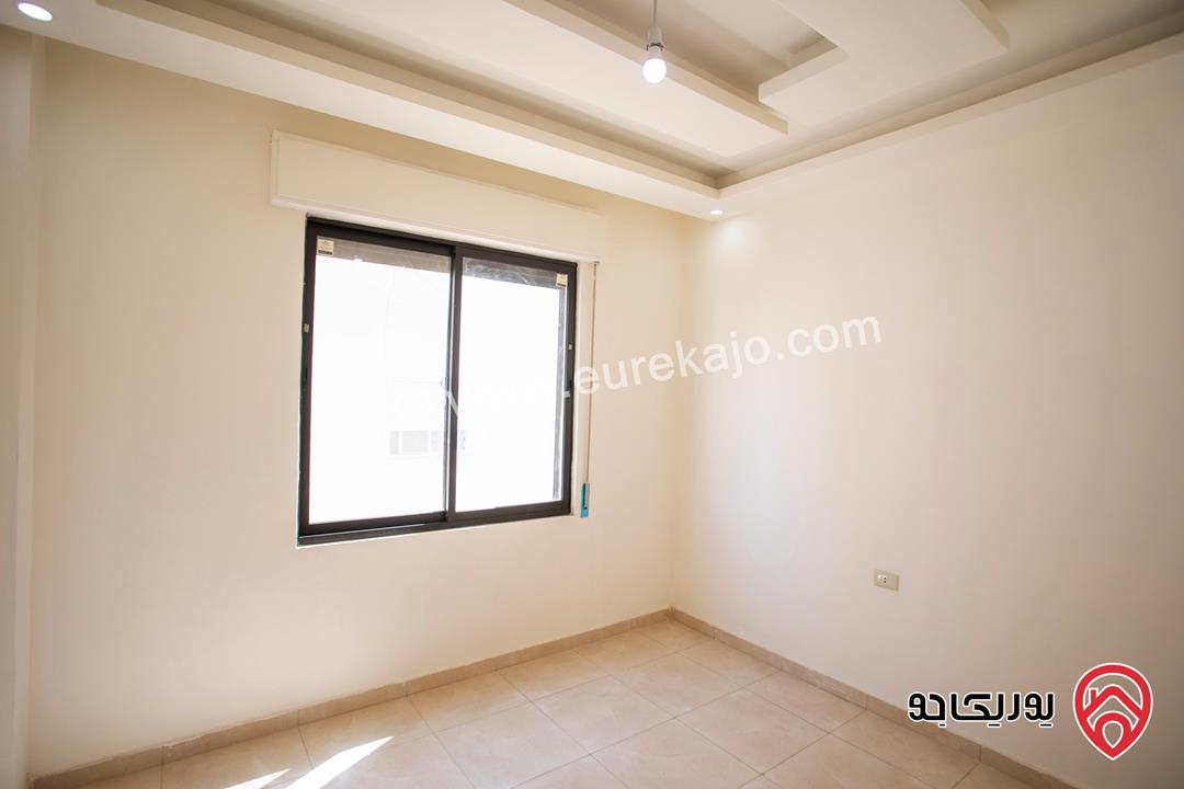 شقة طابق ثالث مع روف مبني مساحة 135م للبيع في عمان - ابو علندا فقط ب 50 الف كاش مع امكانية الدفع بالاقساط