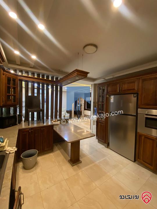 شقة أرضية مفروشة فاخرة للبيع في عمان - أم السماق مساحة 245م مع حديقة وترسات 120م