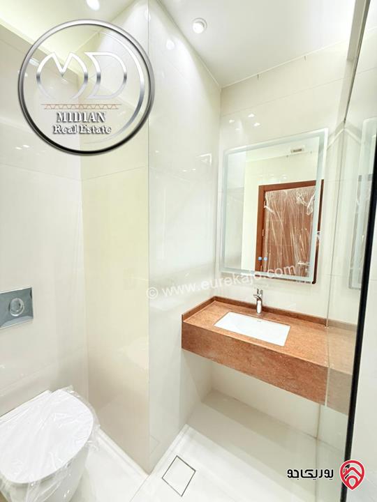 شقة ارضية للبيع في عمان - خلدا مساحة 180م مع ترس وحديقة 200م تشطيبات ديكورات عصرية فاخرة جديدة لم تسكن